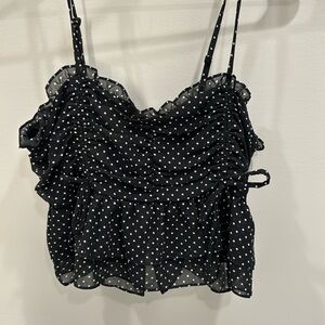 Black and white polka dot mini shirt with ruffles